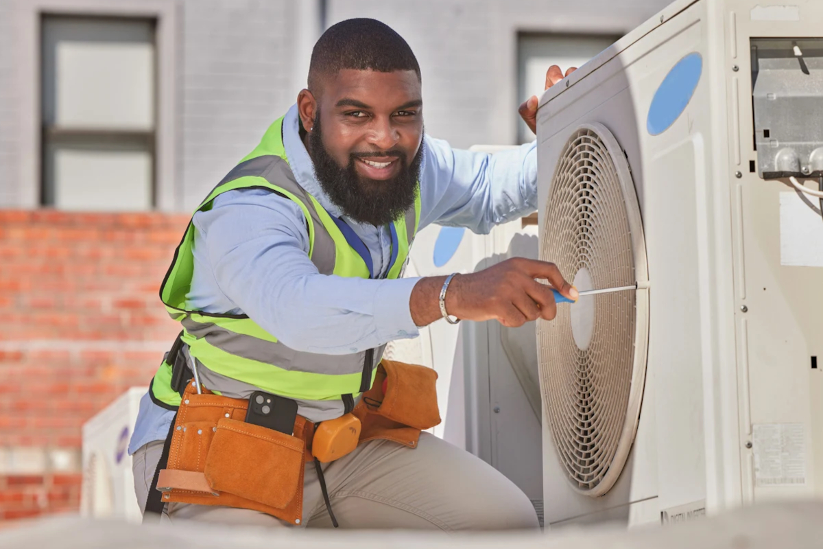 AC repair man working.